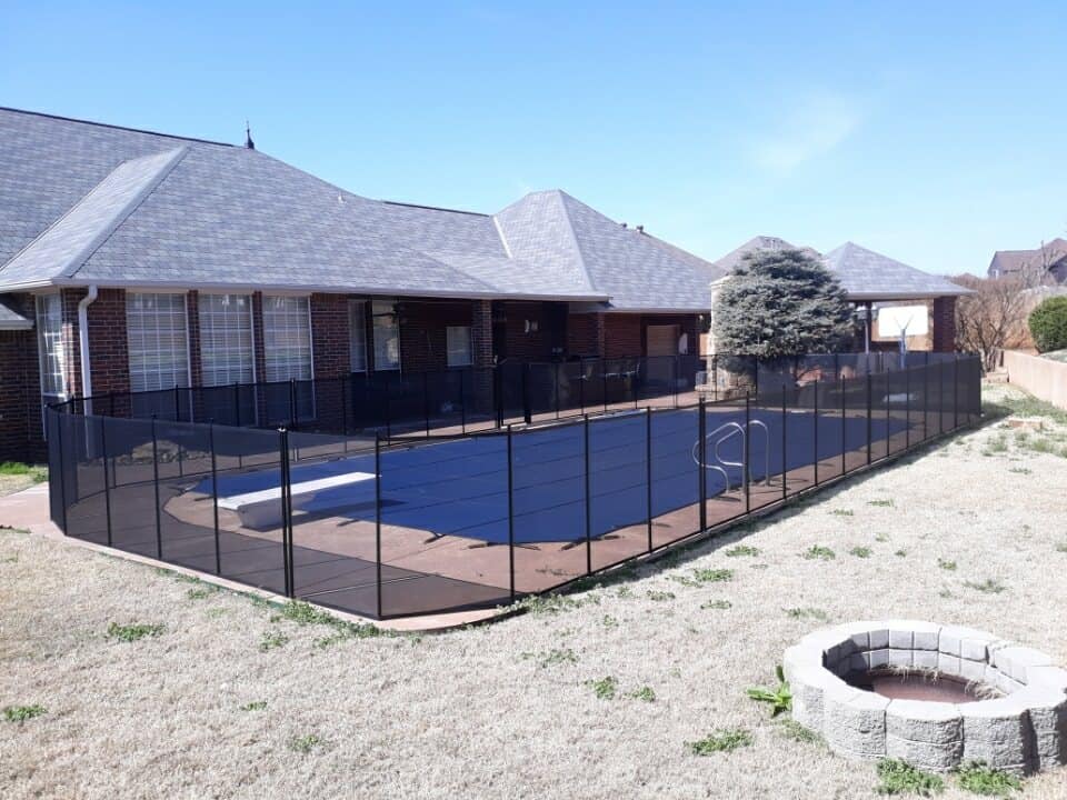 135 ft 4 ft tall Life Saver mesh safety fence installed - Christina