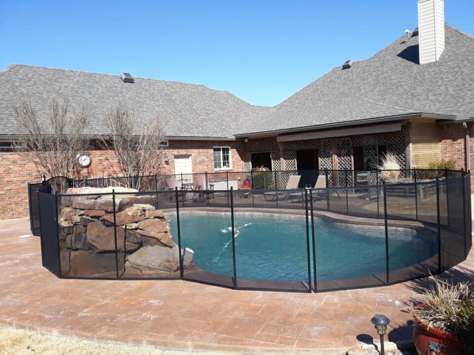 135 ft black Life Saver mesh pool safety fence installed Piedmont, OK - Tom