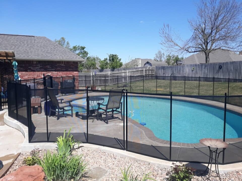 135 ft black Life Saver removable mesh pool fence installed Stillwater, OK