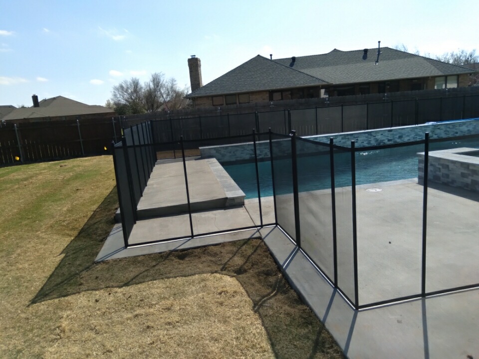 135ft Life Saver pool fence solid core square corners installed in Edmond, OK