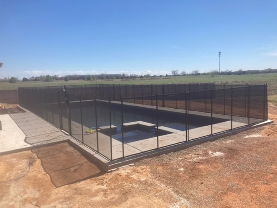 135ft Life Saver solid core pool fence installed in Edmond, OK